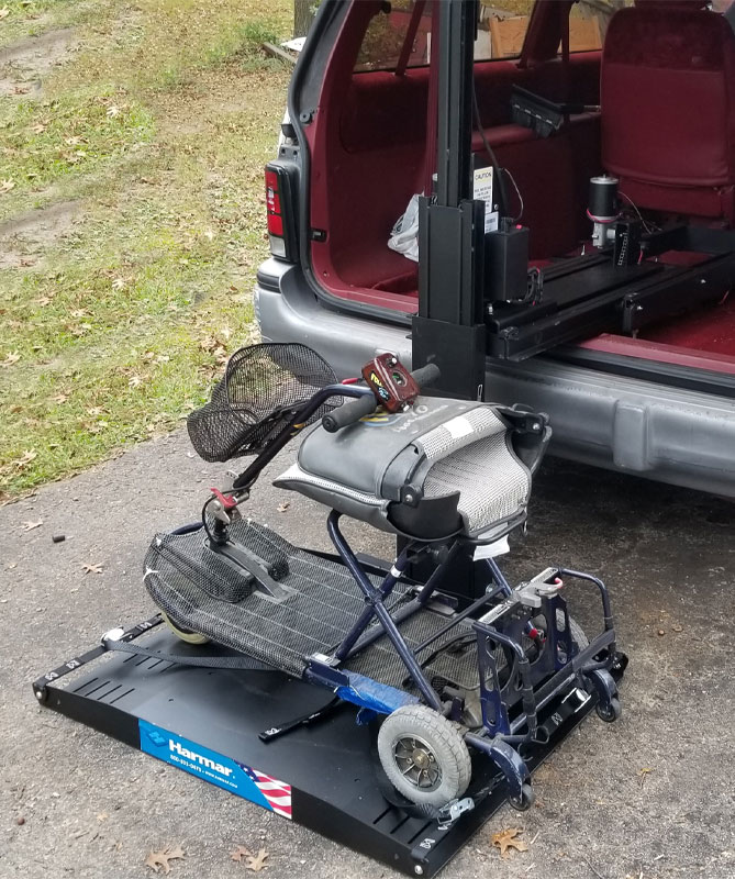 Hybrid lifts are mounted in the vehicle’s cargo area and are
              designed to move out and down so the mobility device is loaded
              onto the platform on the ground.